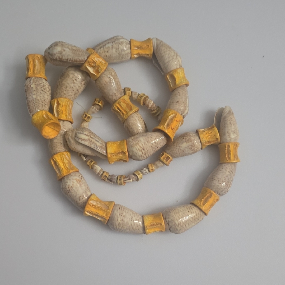 Elegant Gold and Cream Beaded Necklace